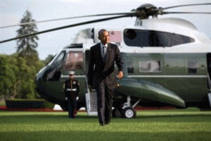 President Barack Obama walks from Marine One on arrival on the White House's South Lawn, July 5, 2016, a few days before leaving to attend the NATO Summit in Warsaw, Poland., From ImagesAttr