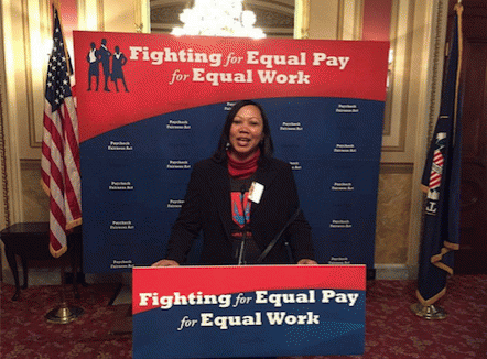 A MomsRising member speaks out for equal pay on Capitol Hill
