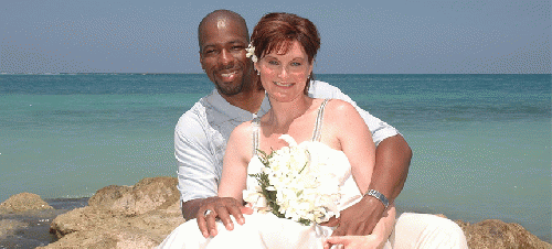 Jeffrey and Holly Sterling honeymooning on the beach in Jamica, June 2007., From ImagesAttr