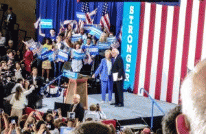 Hillary Clinton and Bernie Sanders in New Hampshire on July 12, 2016., From ImagesAttr