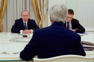 U.S. Secretary of State John Kerry listens to Russian President Vladimir Putin in a meeting room at the Kremlin in Moscow, Russia, at the outset of a bilateral meeting on July 14, 2016.