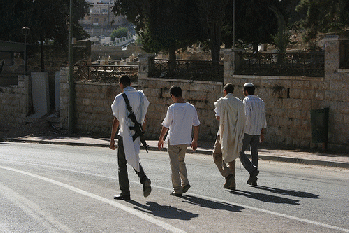Settlers taking a walk on Shuhada Street, From FlickrPhotos
