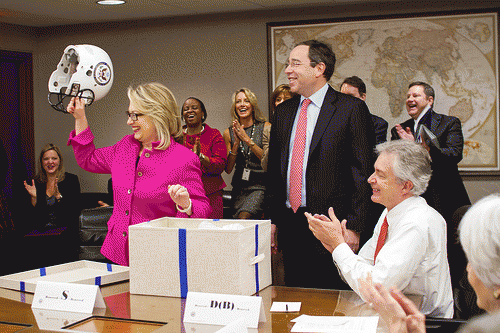 Secretary Clinton Is Presented With a Football Helmet, From FlickrPhotos