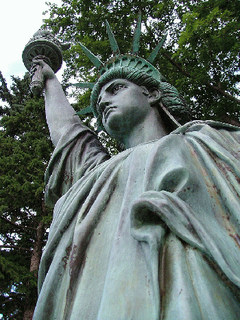 From commons.wikimedia.org/wiki/File:Statue_of_Liberty_bronze_replica_Sioux_Falls_SD.jpeg: Statue of Liberty replica -- I'm outta here..., From ImagesAttr