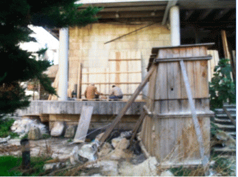 Workmen making temporary repairs to the Aleppo National Museums Admin Building following another mortar attack. To the right is one of the outdoor very heavy 'garden antiques' that has been wrapped in protective material, placed inside a reinforced wood c Workmen making temporary repairs to the Aleppo National Museums Admin Building following another mortar attack. To the right is one of the outdoor very heavy 'garden antiques' that has been wrapped in protective material, placed inside a reinforced wood c