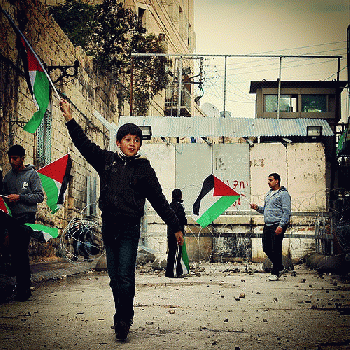 A Palestinian boy at a demonstration protesting the closure of checkpoint., From FlickrPhotos