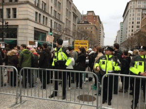 Police maintain barriers to control anti-Trump protesters near the presidential inauguration, Jan. 20, 2017., From ImagesAttr