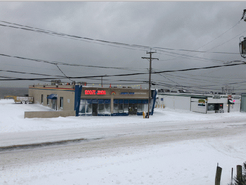 View at the intersection of Ocean View Ave and First View Street, facing north. Chesapeake Bay can be seen at left, historic Greenie's Bar and Grill is at right., From ImagesAttr