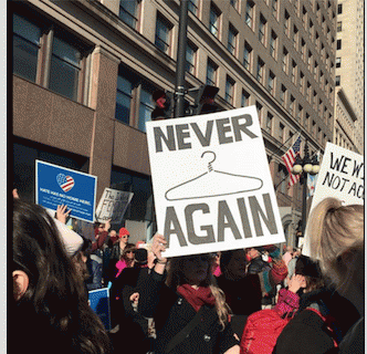 The infamous coat hanger, symbol of back alley abortions of yesteryear