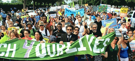 Supporters of Bernie Sanders and the Green Party march with Cornel West in Philadelphia, PA, during the Democratic National Convention.