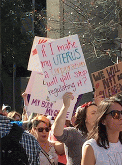 sign reads: If I make my UTERUS a corporation, will you stop regulating it?