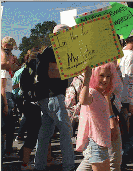 sign reads: I'm here for my future