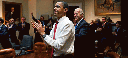 President Barack Obama and White House staff react as the final votes are counted for the passage of the Affordable Care Act, March 21, 2010., From ImagesAttr