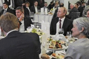 Retired Gen. Michael Flynn (left) sitting next to Russian President Vladimir Putin at a dinner marking the RT network's 10-year anniversary in Moscow, December 2015. Also, at the table (on the right) is Jill Stein, who became the Green Party's presidentia