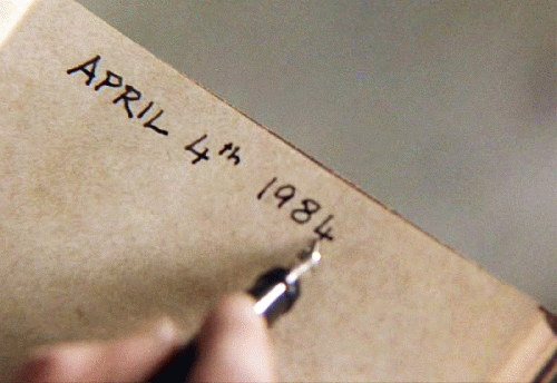 Capture from film 1984. John Hurt signs the date on the actual date of 4/4/1984, when fillmed, From ImagesAttr