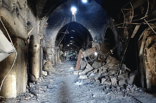 Walking through the rubble of Aleppo's ancient Souks. Photo: Maher Jalloum., From ImagesAttr