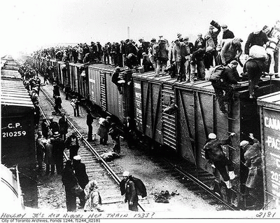 Hobos hopping a train., From ImagesAttr