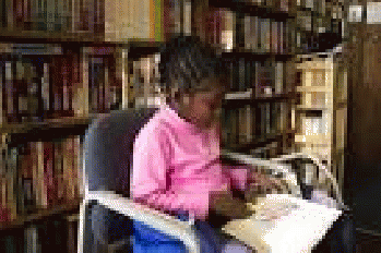 Black Girl Reading a Book in Bookstore Argos Books Trip Wi. | Flickr640 �-- 427 - 190k - jpg
