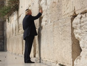 President Donald Trump places a prayer in-between the stone blocks of the Western Wall in Jerusalem, May 22, 2017., From ImagesAttr