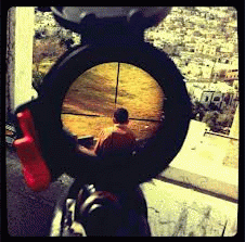 Photograph taken by an Israeli sniper of the head of a Palestinian boy in the cross-hairs of a rifle scope., From ImagesAttr