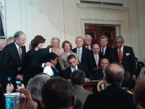 President Barack Obama signing the Affordable Care Act on March 23, 2010.