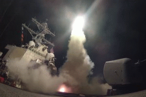 The guided-missile destroyer USS Porter conducts strike operations against a Syrian air base on April 7, 2017., From ImagesAttr