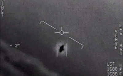 Screen shot from a video released by US Defense Department's Advanced Aerospace Threat Identification Program, showing an encounter between a US Navy F/A-18 and an Unidentified Flying Object [public domain]., From ImagesAttr