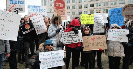 FCC commissioners Jessica Rosenworcel and Mignon Clyburn joined protesters outside the panel's headquarters on Thursday before issuing a dissent to Republican chair Ajit Pai's proposal to end net neutrality protections. The repeal was passed with a 3-2 vo, From ImagesAttr