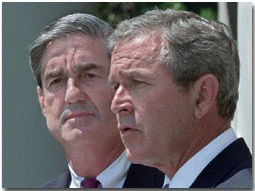 Robert Mueller with President George W. Bush on July 5, 2001, as Bush nominated Mueller to be FBI Director., From ImagesAttr