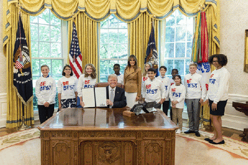 President Trump and Melania Trump signing a 'Be Best' initiative the day after Sen. Senator Jeff Merkley was barred from examining a children's detention center in Brownsville, Texas., From ImagesAttr