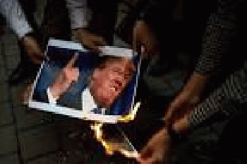 Iranians burn an image of President Donald Trump during an anti-US demonstration, From GoogleImages