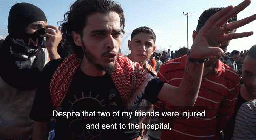 Young man at the Gaza border fence, in the documentary Killing Gaza, by Max Blumenthal and Dan Cohen., From ImagesAttr