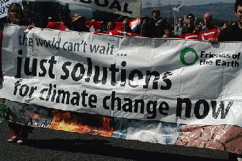 FoE banner - 'just solutions for climate change now'