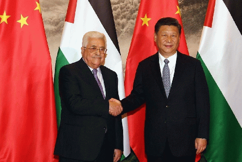 Palestinian President Mahmoud Abbas (L) shakes hands with President of China Xi Jinping (R) in Beijing, China on 18 July, 2017, From ImagesAttr