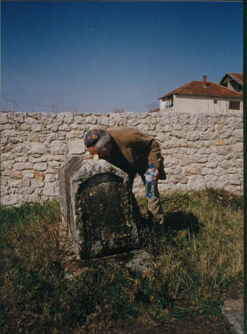 The author at the grave of R. Danon, Stolac, Hercegovina, From ImagesAttr