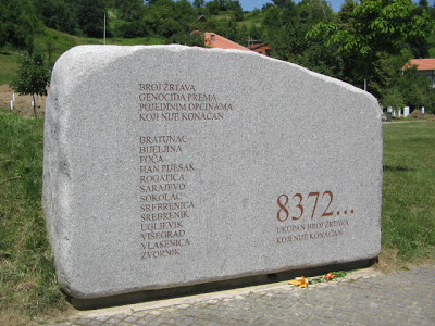 PHOTO: The 1995 Srebrenica genocide resulted in a mass scale ethnic cleansing and forcible deportations of 25,000-30,000 people, as well as summary executions of at least 8372 men, boys, and elderly., From InText