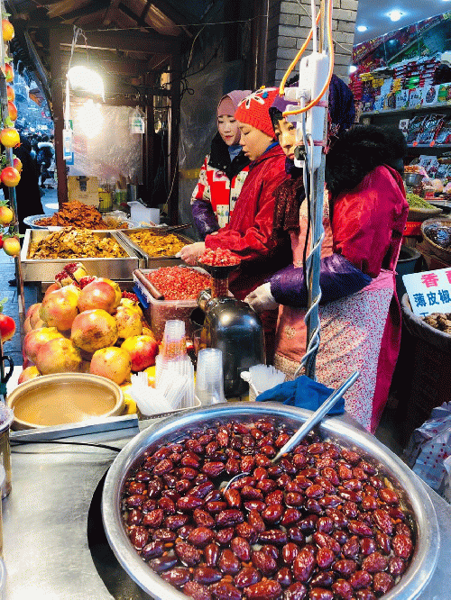 Muslim girls selling halal food in China