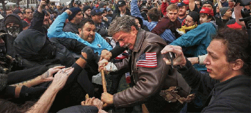 Americans fighting Americans at Berkeley California over the presidency of Donald Trump. Americans fighting Americans at Berkeley California over the presidency of Donald Trump.