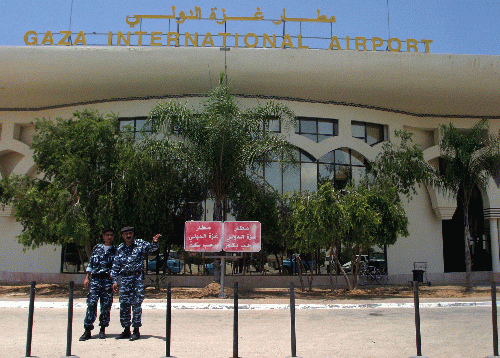 A pair of lonely guards stand in front of the defunct Palestinian airport in Gaza. The equally defunct Palestine Airlines hasn't flown a flight in almost 20 years, but the corrupt Palestinian Authority budgets tens of millions every year for 