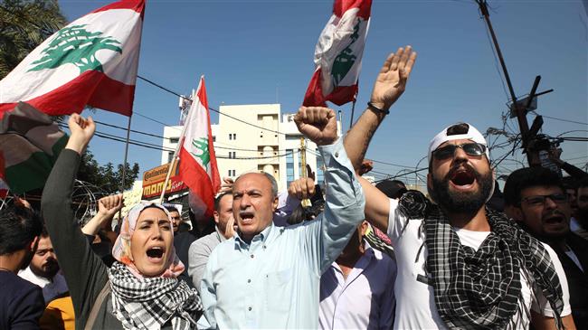 Burning US, Israeli flags, Lebanese slam foreign intervention. Hundreds of Lebanese protesters in front of the US embassy in Beirut slam foreign intervention in their domestic affairs.