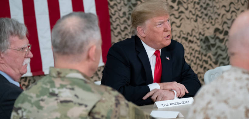 President Donald J. Trump attends a briefing with military leadership members Wednesday, December 26, 2018, at the Al-Asad Airbase in Iraq., From InText