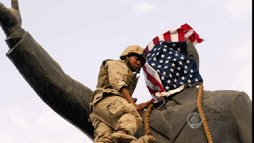 Marine Sgt. Ed Chin draping the U.S. flag over Saddam Hussein's statue, Baghdad, April 9, 2003. V, From Uploaded