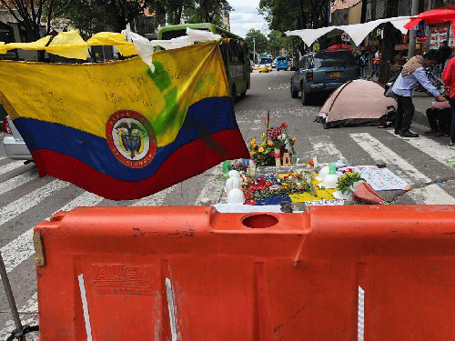 Where Dilan Cruz was killed, torn Colombian flag