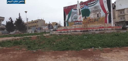 Mural of the Arab Socialist Ba'ath Party — Syria Region at the Mihrab roundabout in the center of the city of Idlib, northwestern Syria.