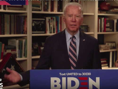 Note Biden's hand. He's signaling to someone off camera as he fumbles reading a teleprompter, or worse, cards