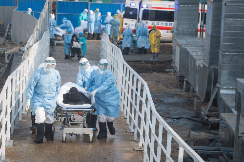 Medical workers take coronavirus patients to their isolation wards, From Uploaded