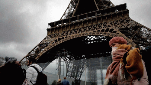 A  mask-wearing French citizen in Paris., From Uploaded