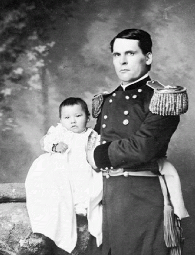 Gen. L. W. Colby of Nebraska State Troops Holding Baby Girl, Zintkala Nuni (Little Lost Bird), Found On Wounded Knee Battlefield, South Dakota, 1890 n.d. Gen. L. W. Colby of Nebraska State Troops Holding Baby Girl, Zintkala Nuni (Little Lost Bird), Found On Wounded Knee Battlefield, South Dakota, 1890 n.d.