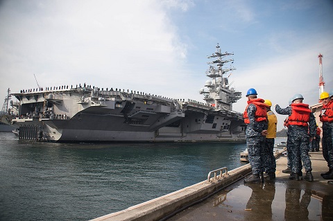 Two U.S. aircraft carriers in the Pacific have been idled by onboard outbreaks of the coronavirus