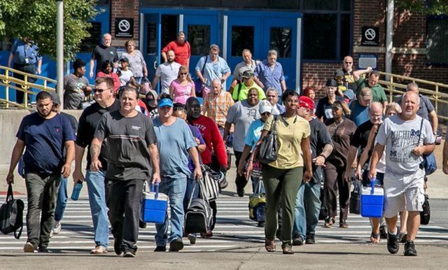 Autoworkers getting off a shift at the Fiat Chrysler stamping plant in Warren, Michigan, From InText